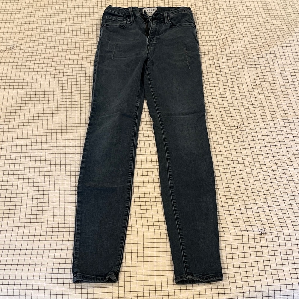 Frame women’s distressed dark jean